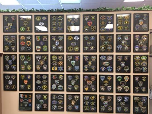 These patches are all of the police/fire departments that the owners have trained over the years!