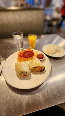 Chorizo burrito with a side of biscuits and gravy. Excellent breakfast burrito, not so great biscuits and gravy.