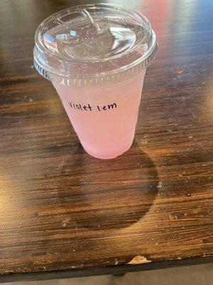 Homemade lemonade with violet syrup