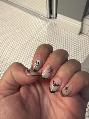 Sam always does a great job! This time I brought it some stickers he apply and give me my spooky Halloween nails