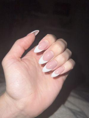 French acrylic nails, long almond shape.