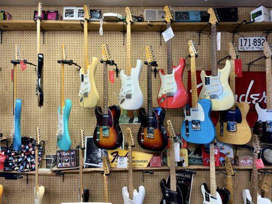 Fender Custom Shop Left-handed Guitars on the Wall.