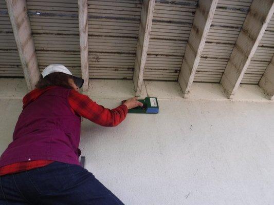 Checking the EIFS wall for moisture using the Tramex Wet Wall Detector