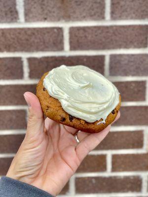 Seasonal pumpkin chocolate cookie with cream cheese frosting