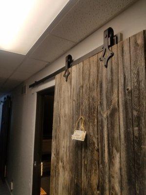 1900's Track Barn Doors for Room doors. Nice Touch!