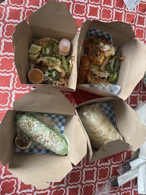 Tinga burrito, elote, tacos with tinga, pastor, fried crab, and fried fish