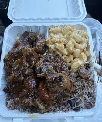 Oxtail with rice and peas and Mac and Cheese