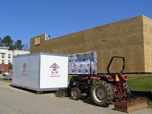 Our Mobile Attic delivery truck is a standard role back truck.  This allows us to easily place your storage unit where required.