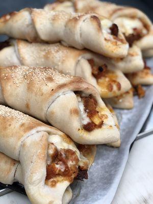 Chicken Parmigiana Pizza Rolls. Always served with a side of marinara sauce