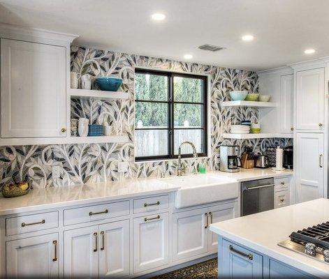 Kitchen with open shelves, flush mount cabinets, beautiful tile and new windows.