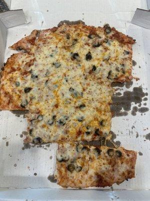 Large pizza with extra cheeses, pepperoni and black olives.