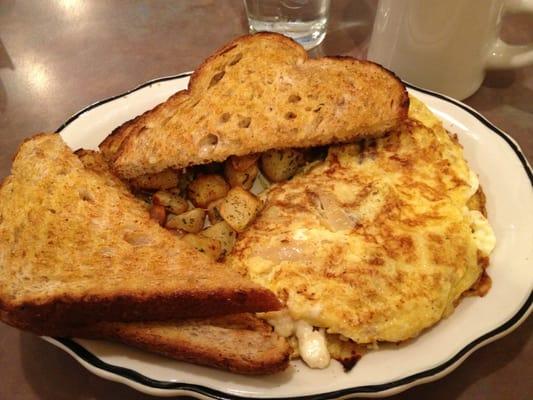 Sausage, carmelized onions & feta cheese omelette served with home fries and wheat berry (??) toast