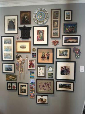 A travel wall comes alive with artifacts mixed in with the frames.