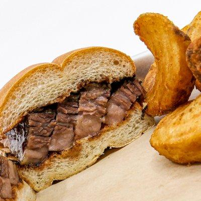 Brisket sandwich and our signature fries.