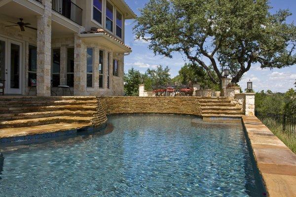 Luxury pools and custom spas can help elevate your outdoor living! Call us today for a consultation!