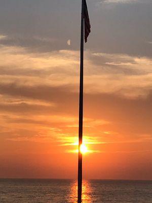 Flag pole by the beach