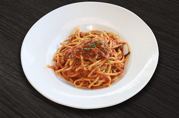 Bucatini All' Amatriciana: Pecorino Romano cheese, pancetta, pepper flakes, onions, tomato sauce.