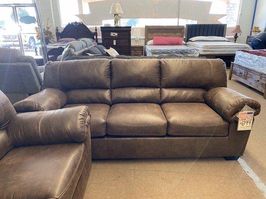 Our new couch looks like leather but it's microfiber  Comes with a loveseat!