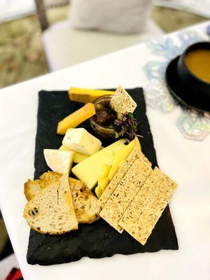 domestic cheeses with dried fruit, mostarda, toasted baguettes