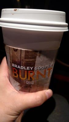 Probably not the best idea to have the word "Burnt" on the cup holder associated with your coffee, no?