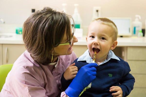 Dr. Ford showing a little one what the "spinny brush" feels like.