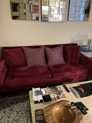 Living spaces couch with amethyst pillows