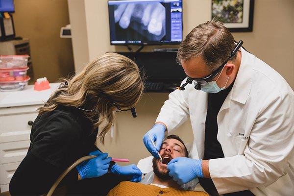 Dr. Cooper examining patient