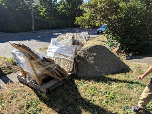 Huge slabs of patio stones, we spent hours breaking up. Gravel dumped on our grass despite the $100+ delivery fee and $25 gravel bin fee.