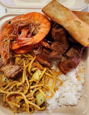 Plate Lunch with rice, pancit, adobo, fried garlic shrimp, and banana lumpia