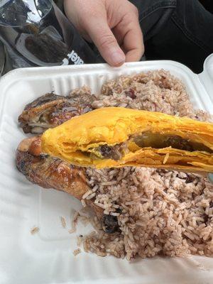 Beef patty (with jerk chicken in the background)