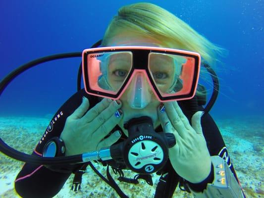 Enjoying my dive in Cozumel on the 4th of July with my stylish nails designed by Tina.