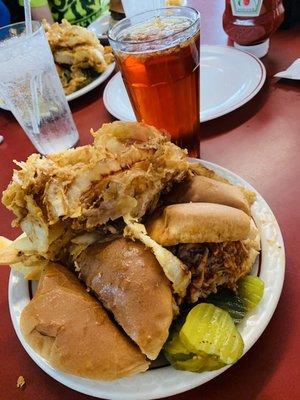 Aristocratic BBQ sandwich (Double) with onion rings, fries, and pickles.