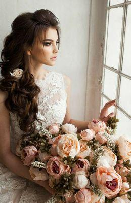 A bride looking out the window