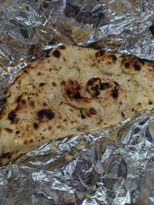 Garlic Naan, chewy texture with garlic pieces but not very buttery/salty.