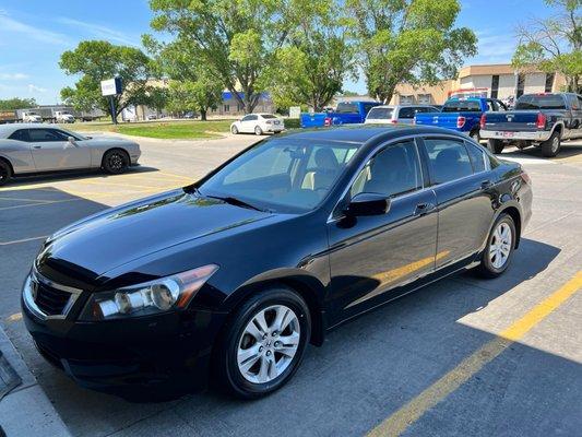 A black Honda After an Exterior Detail.