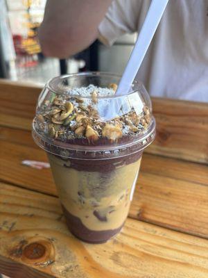 Acai with granola, peanut butter, coconut, chia seeds, banana and strawberry! SO good!