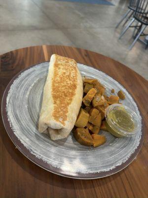 Breakfast burrito with sweet potato hash.