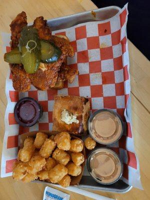 Tenders with biscuit and tots