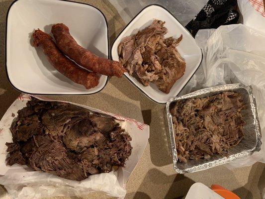 Chorizo, carnitas, lamb, barbacoa (prepping for dinner)