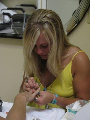 Stephanie focused on beautifying nails.