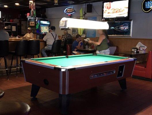 Stop in and play a round of pool.