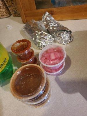 Salsa, tortillas, pickled onion