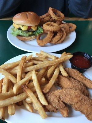 Huge portions.  Cheeseburger and onion rings, chicken tenders and fries.