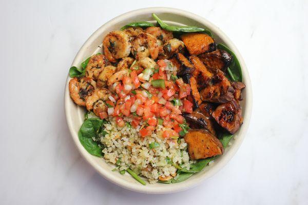 Athlete Bowl: Pan-Seared Shrimp, Roasted Sweet Potatoes, Herb Cauliflower Rice, Baby Spinach, and Factory Pico.