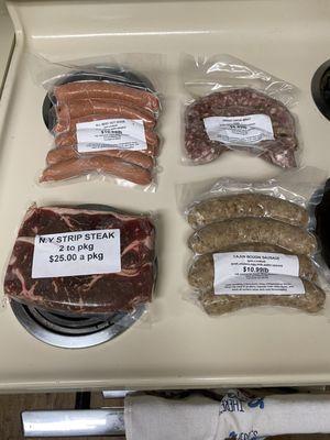 NY strip, Cajun Boudin, Green onion brats and all beef hot dogs