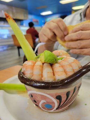 A dozen shrimp in their medium-sized cocktail.  Comes with tostadas and crackers.  A great deal for $12.