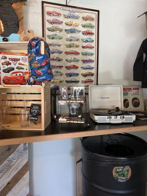 Classic car poster and a wonderful little record player are just some of the fun decor at the Julian Pit Stop!