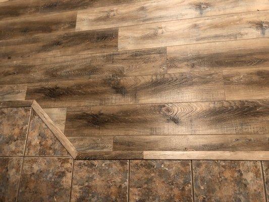 Transition to tile from floating snap lock in Shallowater