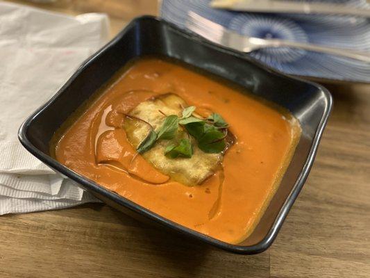 Tomato soup with a crab meat filled wonton