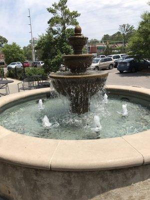 Outdoor seating by fountain